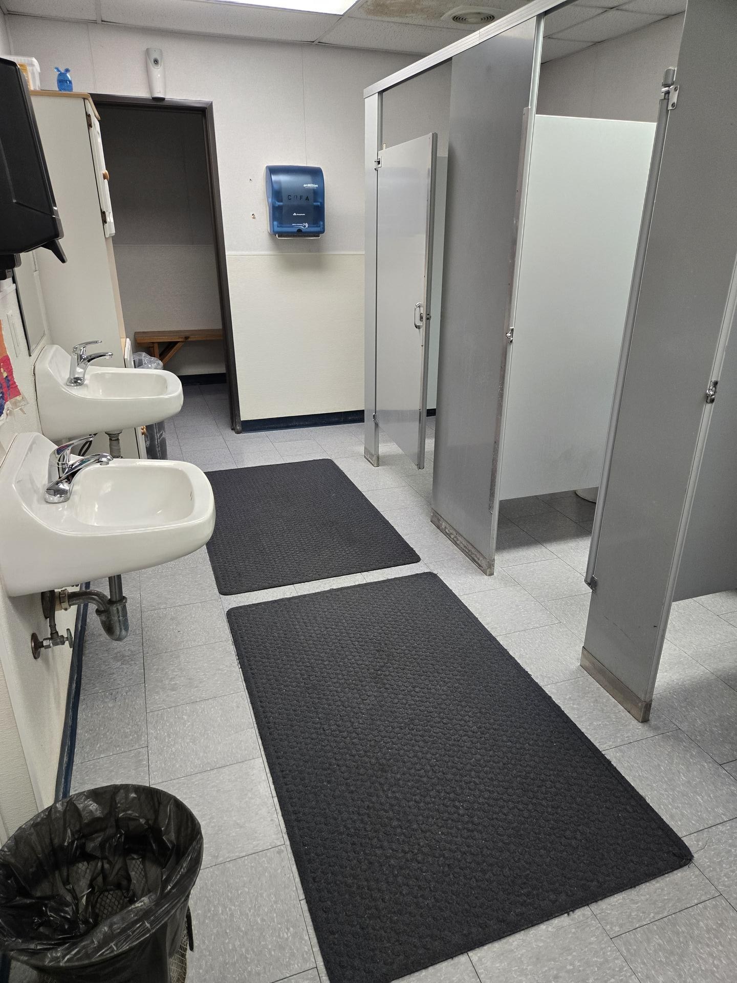 Military facility restroom cleaned