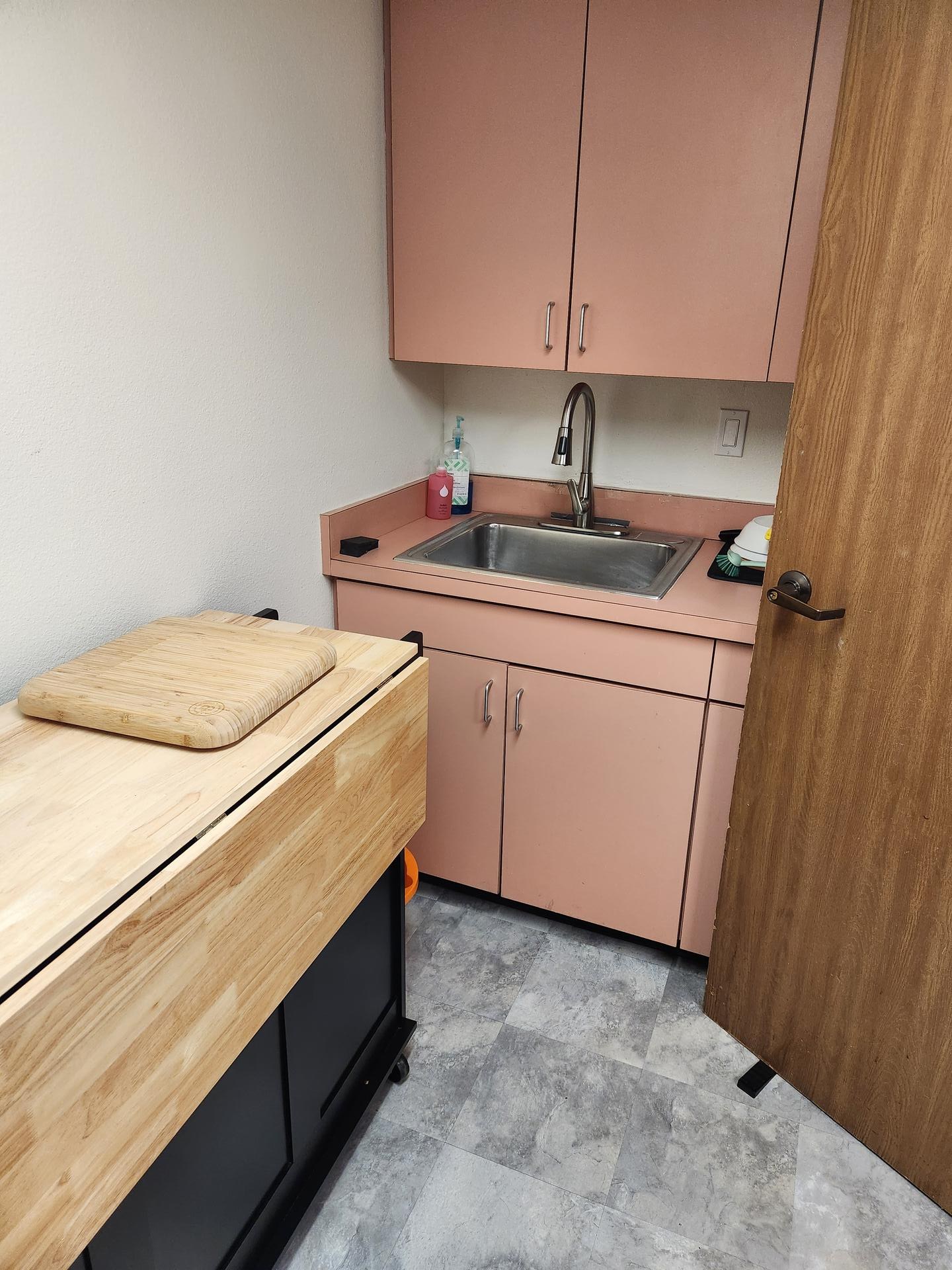 Office kitchenette sink cleaned